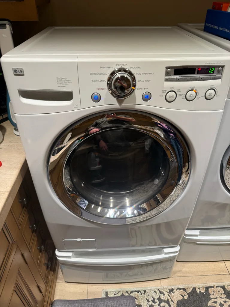 LG washer water inlet valve and shock absorber rebuild in Phoenix
